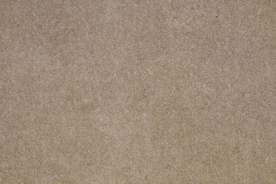 Brown concrete floor texture with small dash pattern. Close-up photo of scabrous background. Horizontal orientation
