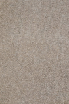 Gray concrete floor texture with small dash pattern. Close-up of scabrous background. Vertical orientation