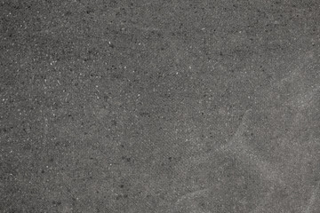 Subtle grain concrete texture close-up. Abstract black and white gritty grunge background
