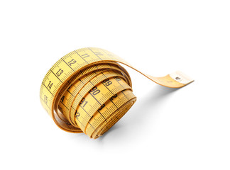 Measuring tape on white background