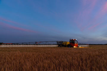Machine for spraying pesticides and herbicides in the field at work