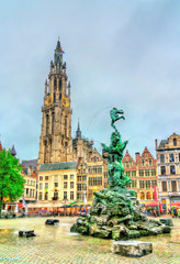 Fototapeta premium The Cathedral of Our Lady and the Silvius Brabo Fountain on the Grote Markt Square in Antwerp, Belgium