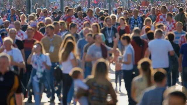 Crowd of people on the street. No recognizable faces