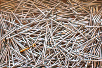very different from all/ hat of the self-tapping  sticking out pile of many nails  view from above
