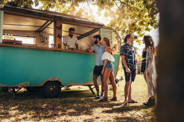 Group of young people at food truck