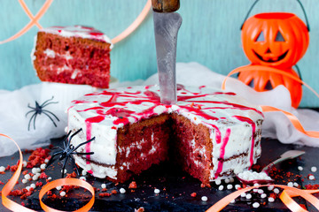Red velvet cake decorated for halloween party, bloody cake