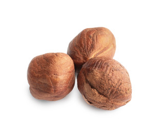 Tasty hazelnuts on white background