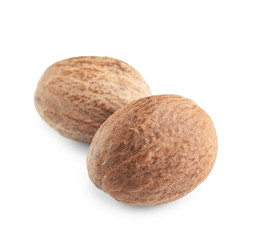 Nutmegs on white background