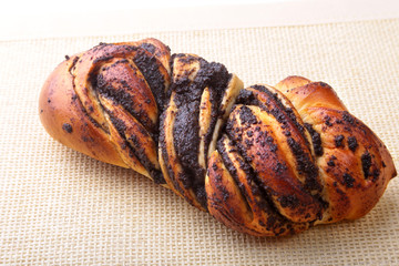 Freshly baked homemade sweet rolls with cinnamon on white background. Healthy Food Snack Concept. Copy space.