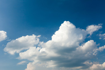 Naklejka na ściany i meble Fluffy cloud on blue sky, white heaven.