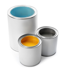 Cans of paint on white background