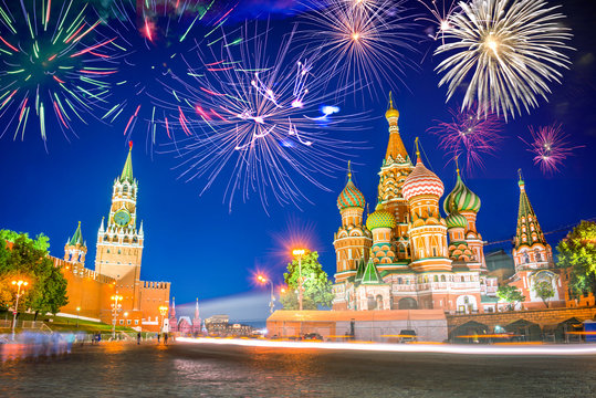 Fireworks over St Basil's cathedral and Kremlin on Red Square at night, Moscow, Russia. New year travel 2020 celebration - Powered by Adobe
