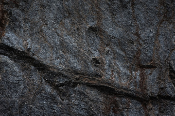 Dark stones texture pattern nature background.