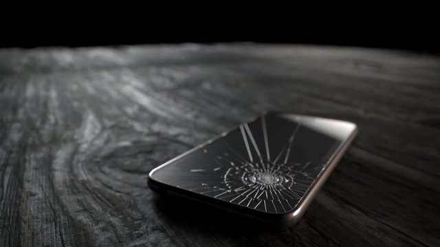 Smartphone crashes onto the wooden floor. Accident insurance coverage.