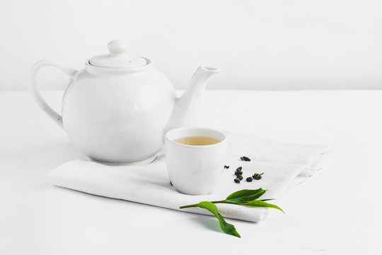 Green tea In white cup White background aroma
