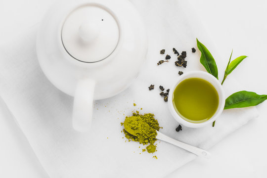 Green tea In white cup White background aroma
