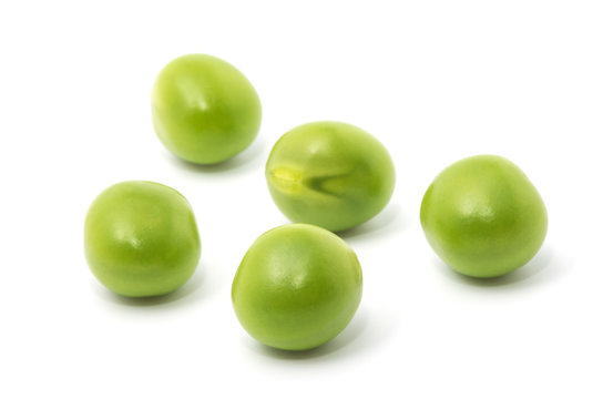 Green peas isolated on the white background