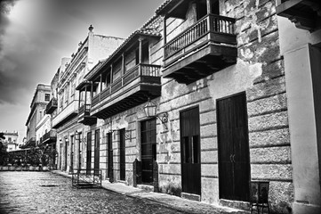 Obispo street and building in Havana black and white photography