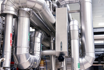 Interior in a factory - stainless steel piping system for supply // Interior in einer Fabrik - Rohrleitungssystem aus Edelstahl zur Versorgung
