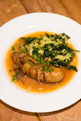 Grilled sausage with Cheesy Creamed Spinach
