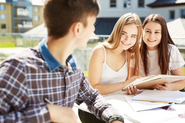 Portrait of three high school students spending time together