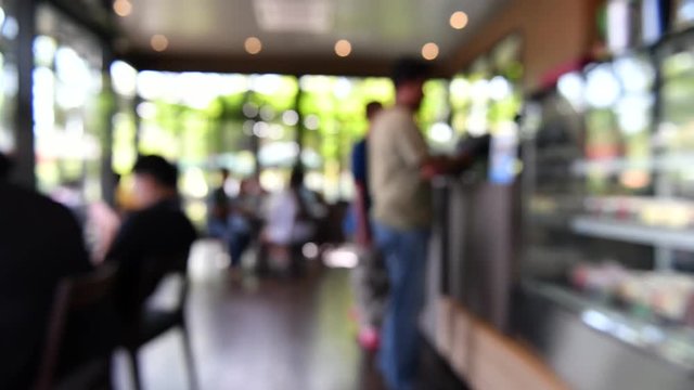 Blur image or defocus of customer in coffee shop, time lapse movie clip