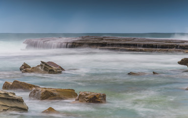 Seascape and Cascades over Rock Ledge
