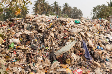 Big rubbish dump by the road at living area