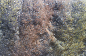 Multi-colored stone background close-up, abstraction