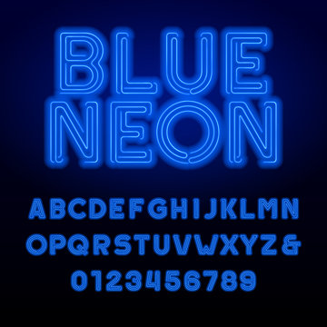 Blue neon tube alphabet font. Neon color bold letters and numbers. Retro vector typeface for your design.