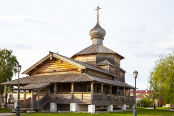 Fototapeta na wymiar Ancient Russian wooden church of the Orthodox Church. A wooden temple on the island of Sviyazhsk which stands on the great Volga river.