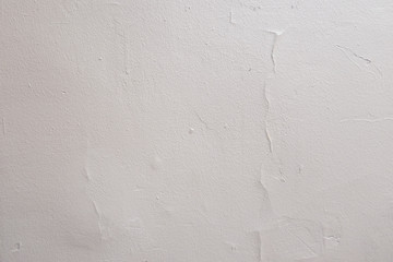 texture of old concrete with plastered light wall