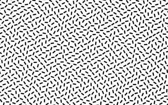 Black and white geometric background with small randomly scattered lines. Creative hipster pattern Vector illustration 