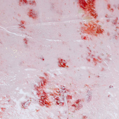 Roll ice cream is made by hand on the freezer. Sweet dessert made from natural berries and ingredients. The process of making food.