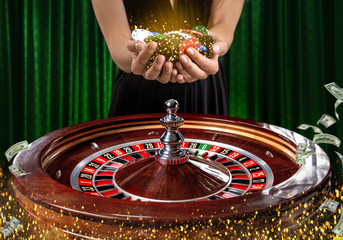 Collage of casino images with a close-up vibrant image of multicolored casino roulette table with...