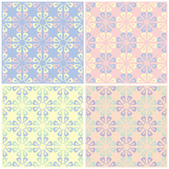 Set of faded colored seamless backgrounds with floral patterns