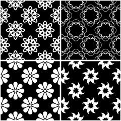 Floral patterns. Set of black and white seamless backgrounds