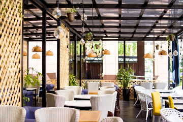 leisure, people and service concept - Interior of Restaurant