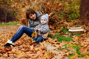 mother and toddler son in fall