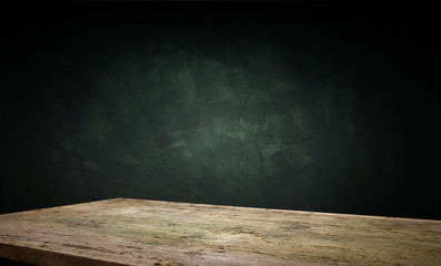Old wood table top with smoke in the dark background