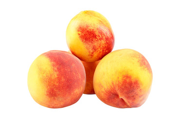 Fresh peach fruits isolated on white background