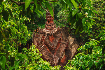 Small Buddhist temple in the jungle. View from above.