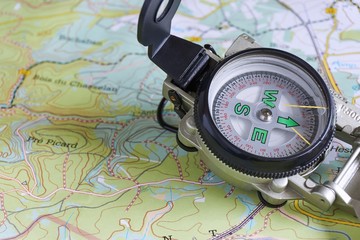 Close-up of military compass on map of the Belgium Ardennes 