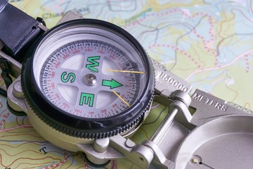 Close-up of military compass on map of the Belgium Ardennes 