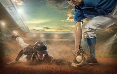 Fototapeta Baseball players in action on the stadium. obraz