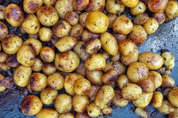 French fried potatoes on firepan.