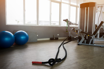 Battle rope in the fitness room for sport healthly club.