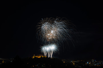 Beautiful colorful firework in city Brno on Spilberk