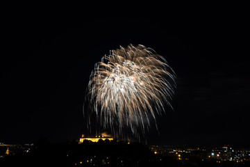 Beautiful colorful firework in city Brno on Spilberk