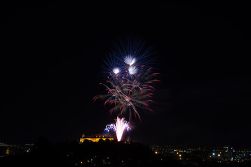 Beautiful colorful firework in city Brno on Spilberk